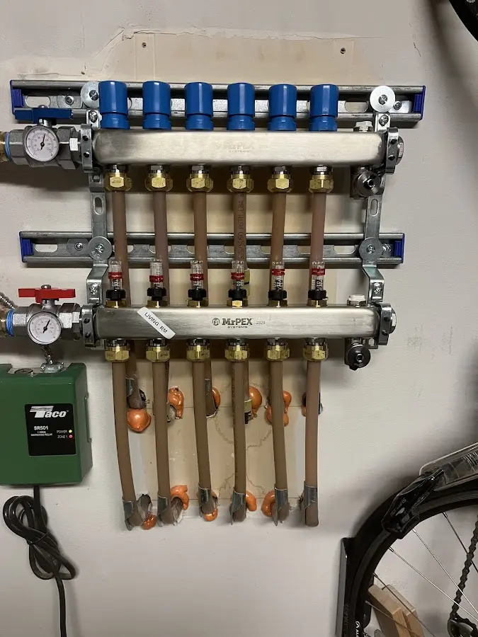 Plumber performing Water Heater Repair at a residential property in Baker City